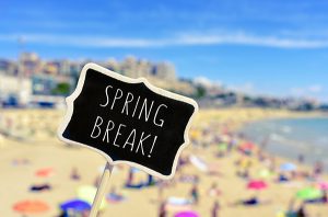 Spring break sign on the beach