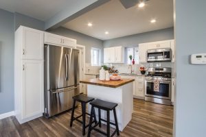 kitchen island with two barstools