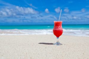 Red frozen drink on the beach