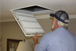 Man changing home HVAC filter